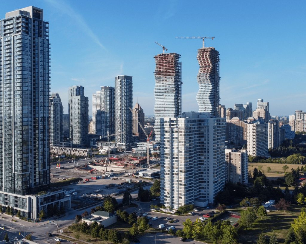 Aerial view of Mississauga townscape featuring buildings, streets, and green spaces.