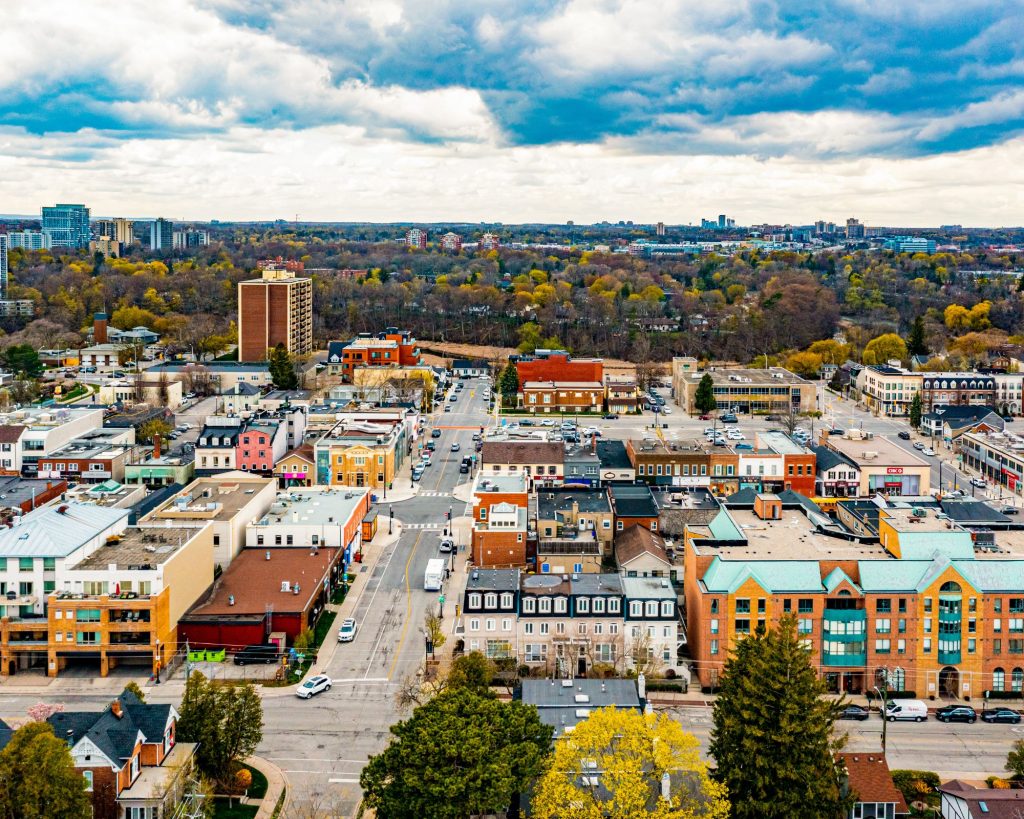 Aerial view of downtown Oakville showcasing buildings, streets, and waterfront.