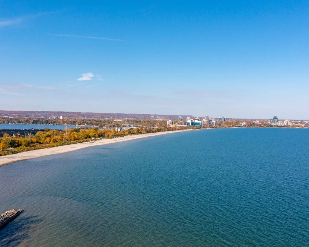 Autumn view of Burlington Beach with colorful fall foliage and tranquil waters